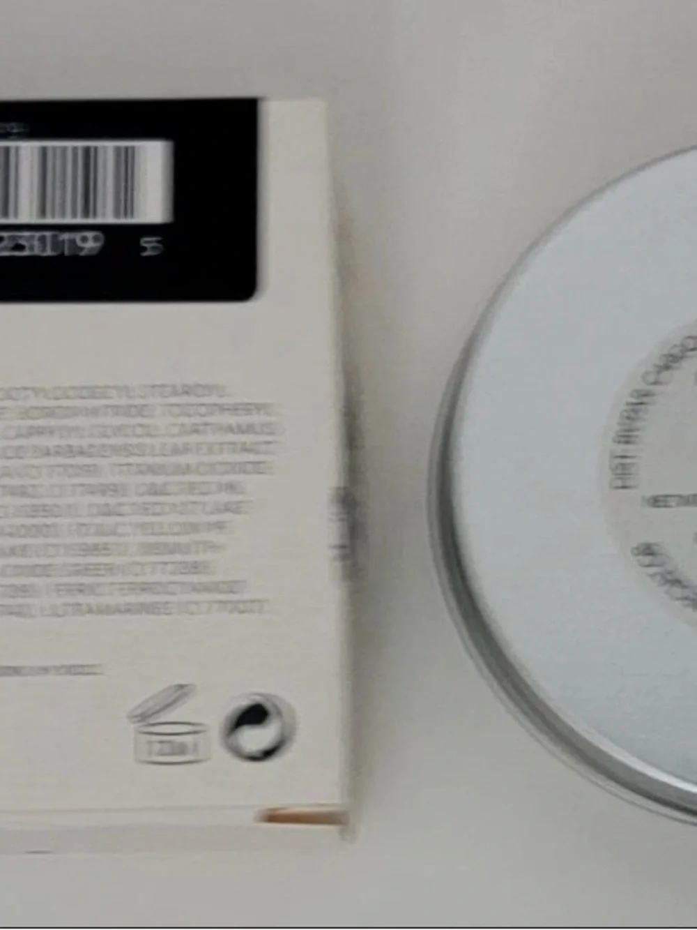 Cargo Cosmetics Powder Blush in Rome (peachy coral in color).